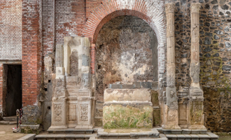 The GPS turned off on the lava. Then a woman placed a river stone in his hand.